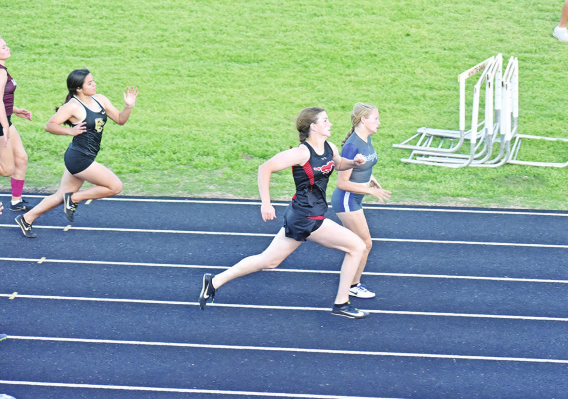 Lady Tigers, Lady Mustangs compete in 153A district track meet